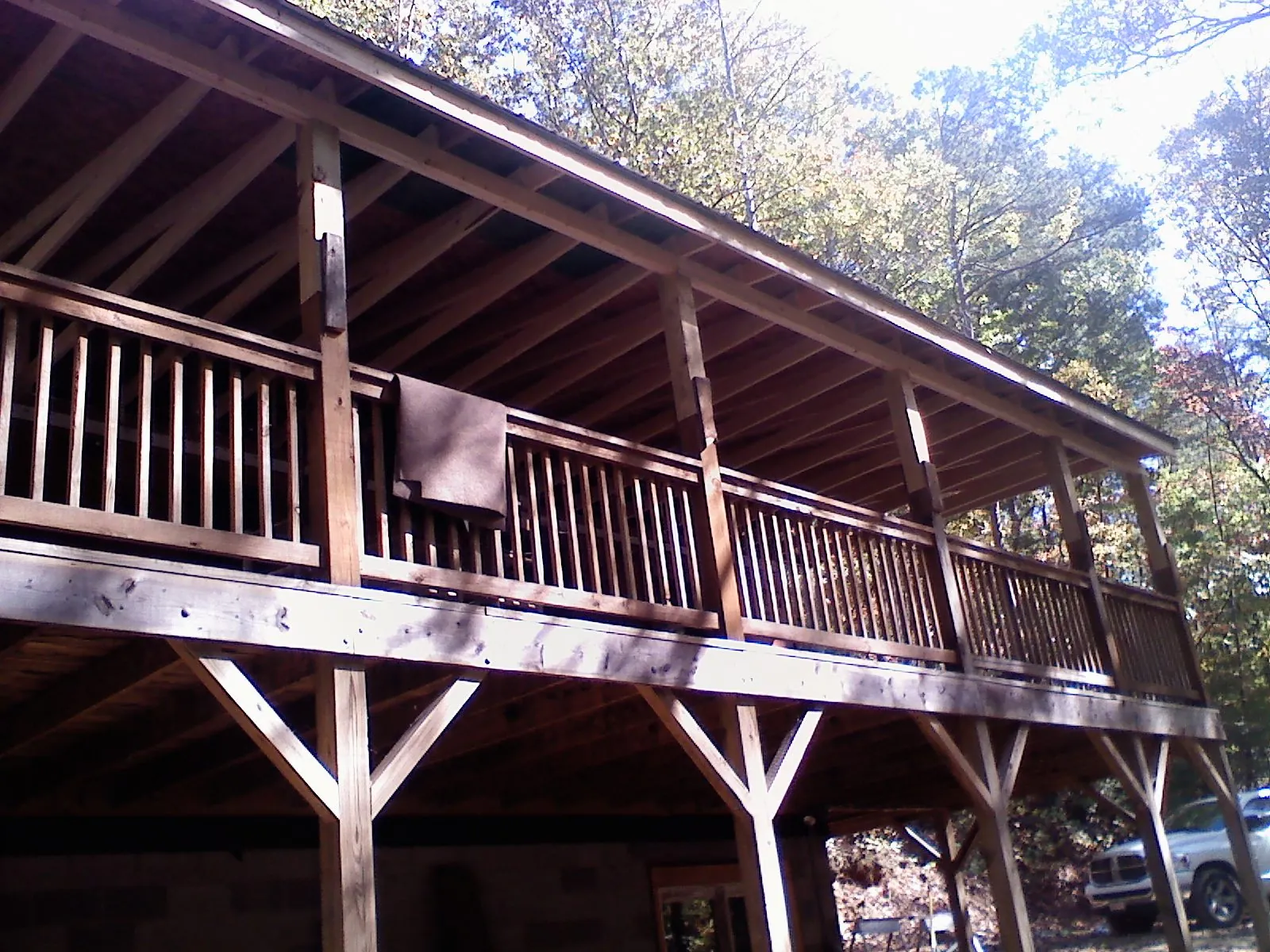 Timber framing under a new elevated porch and deck — Roof Leak Repair in Kanawha by Roofing Brothers